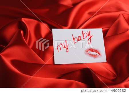 Note on red silk. With an inscription " My baby " and a print of 4909282