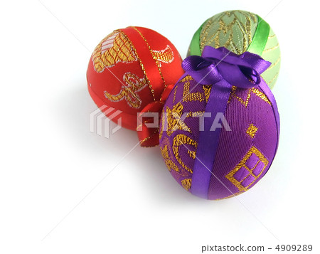 Easter painted egg tied up by tapes Easter painted egg tied up by tapes 4909289