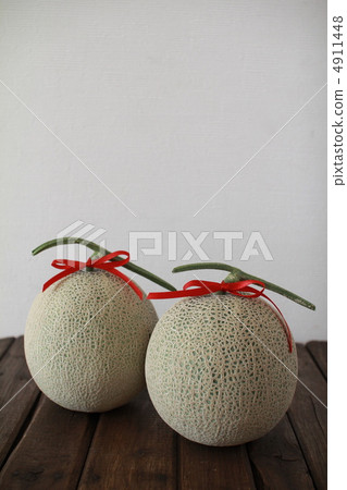 Two netted melons tied with red ribbons - Hokkaido Asahi Melon 4911448
