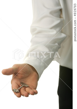 The young businessman with a key in a hand 4919783