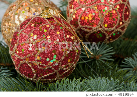 Christmas toys on branches of a fur-tree 4919894