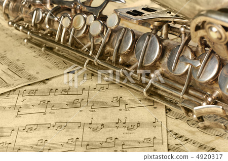 Old saxophone and notes Old saxophone and notes 4920317