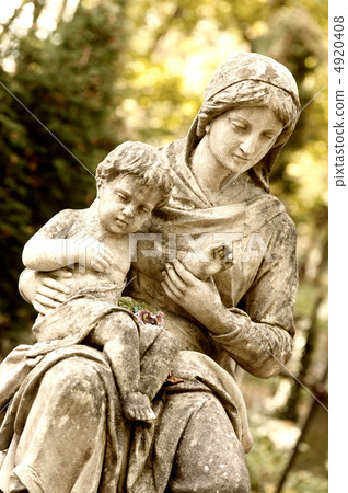 Monument of the woman with the child on a cemetery Monument of the woman with the child on a cemetery 4920408