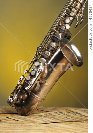 Old saxophone and notes 4920424