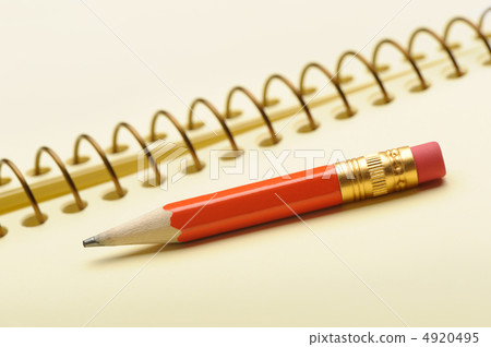 Notebook yellow paper and red pencil 4920495