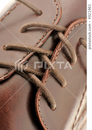 Man's shoes from a brown leather Man's shoes from a brown leather 4921961