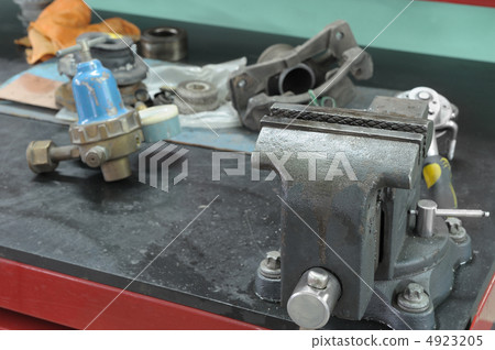 Old a vice on a workbench Old a vice on a workbench 4923205