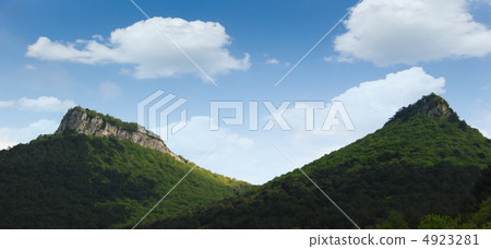 two mountains and forest 4923281
