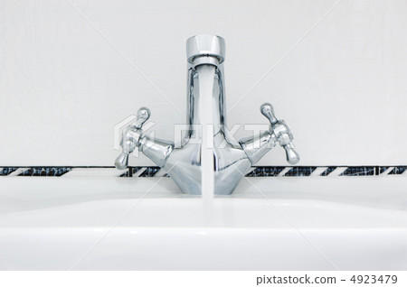 Water tap with a water stream. Water tap with a water stream. 4923479