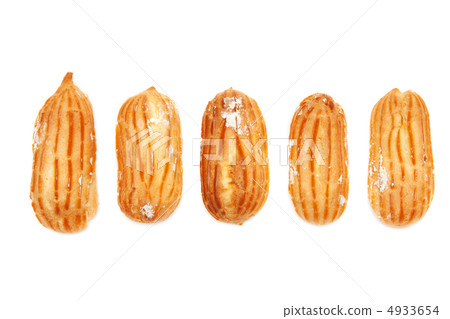 Delicious eclairs arranged unlikely Delicious eclairs arranged unlikely 4933654