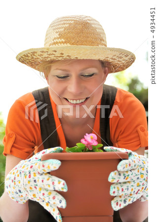 Young woman - gardening 4934451