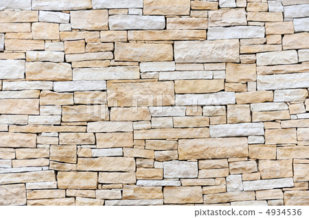 Wall made from sandstone bricks 4934536