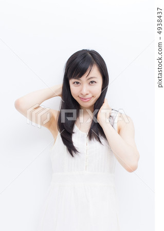 Women touching hair Women touching hair 4938437