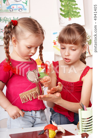 Child playing from plasticine. 4941405
