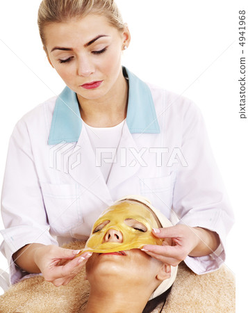 Girl with gold facial mask. Girl with gold facial mask. 4941968