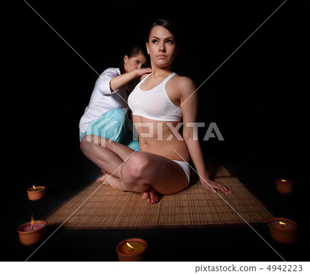 Beautiful girl having thai massage. Beautiful girl having thai massage. 4942223