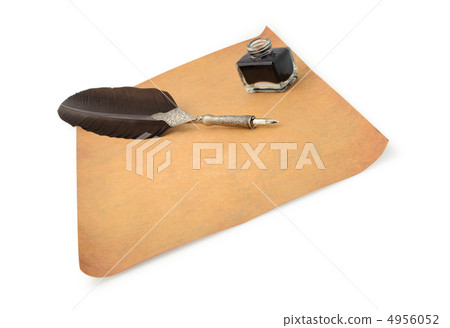 Feather quill and inkwell on an old paper 4956052