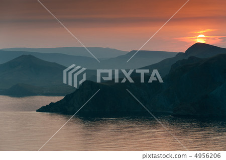 Colourful decline over mountains and the sea. 4956206