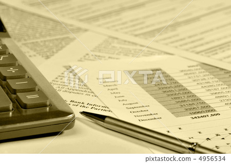 The calculator and the financial report 4956534