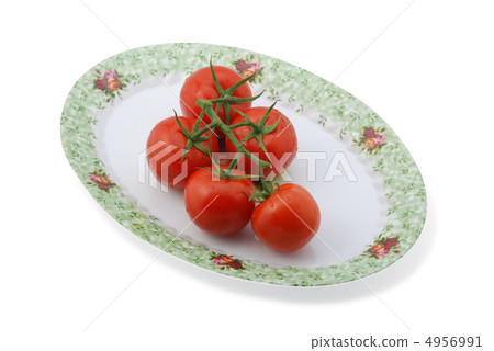 Tomato isolated at dish Tomato isolated at dish 4956991