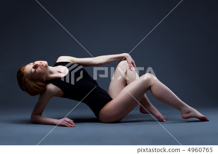 Beautiful sexy woman lay in sport suit Beautiful sexy woman lay in sport suit 4960765