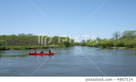 Canoeing down the Kushiro River 4967514