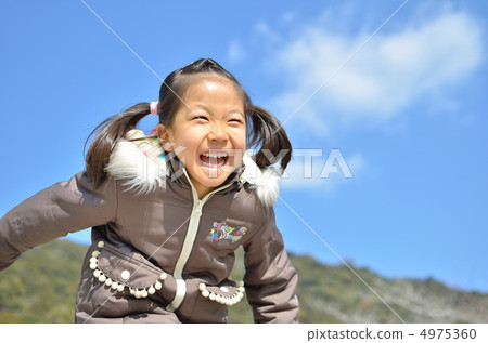 Girls playing in the blue sky (winter) Girls playing in the blue sky (winter) 4975360