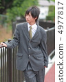 Male high school student in uniform 4977817
