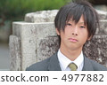 Male high school student in uniform 4977882