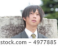 Male high school student in uniform 4977885