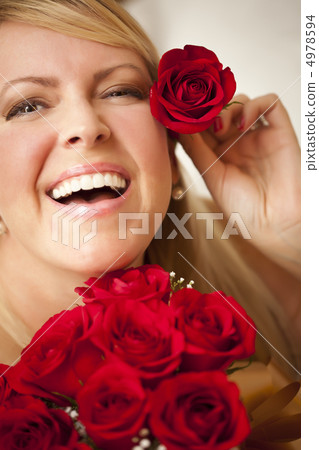 Woman with a Bunch of Red Roses. Woman with a Bunch of Red Roses. 4978594