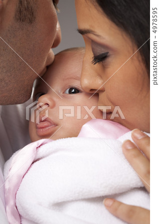 Mixed Race Young Family with Newborn Baby Mixed Race Young Family with Newborn Baby 4978595