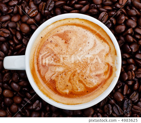 espresso cup in coffee beans espresso cup in coffee beans 4983625