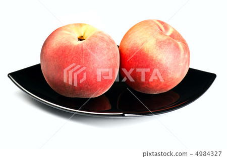 red peaches on black dish 4984327