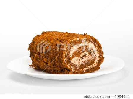 chocolate roll on white dish chocolate roll on white dish 4984431