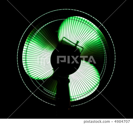 big office fan in green light 4984707