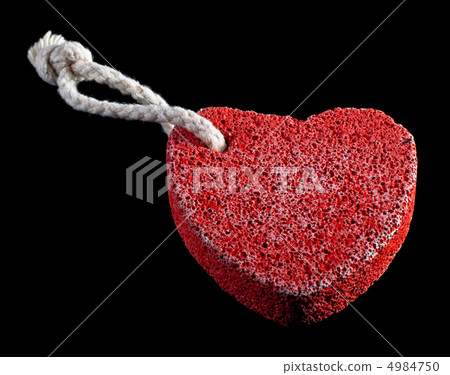 red heart-shaped stone with rope 4984750