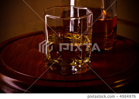 whiskey glass on wooden tray whiskey glass on wooden tray 4984976