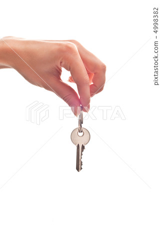 Key in woman's hand Key in woman's hand 4998382