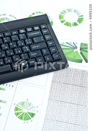 Business chart and keyboard Business chart and keyboard 4999109