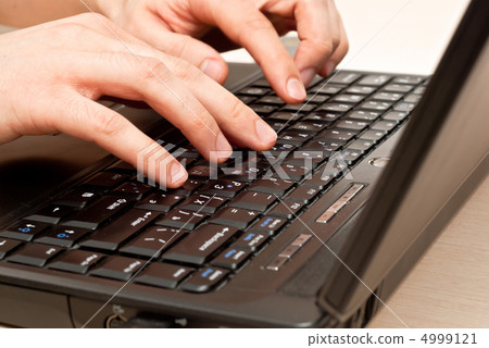Hands typing Hands typing 4999121