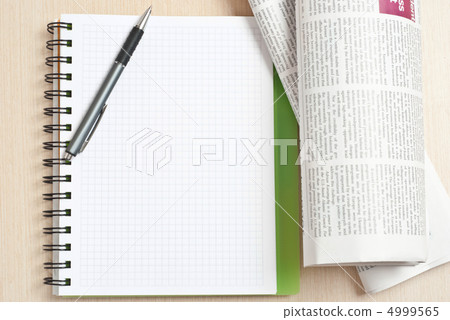 Notebook and newspaper 4999565