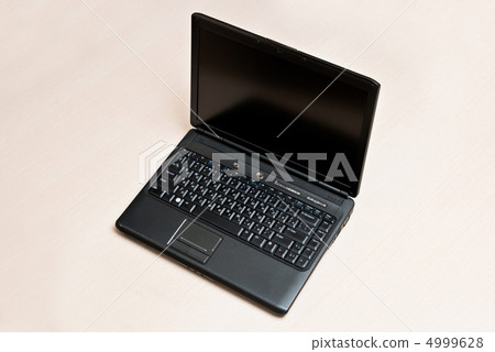 Laptop on desk Laptop on desk 4999628