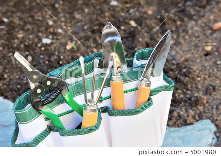 Detail of gardening tools in tool bag - outdoor. 5001980
