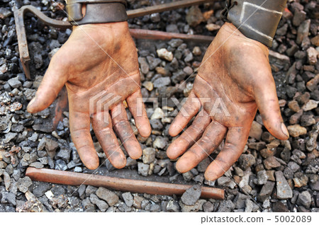 Detail of dirty hands - blacksmith Detail of dirty hands - blacksmith 5002089