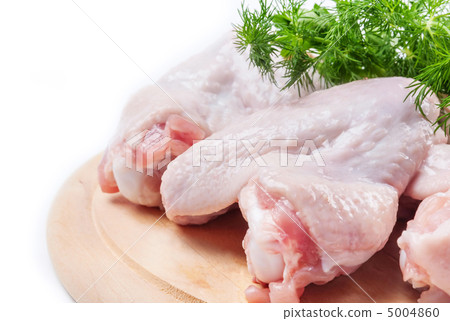 chicken wings on a wooden  board 5004860