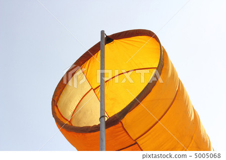 Wind direction Flag on blue cloud sky in  wind 5005068