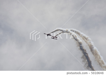 Several planes performing in an air show at Jones Beach Several planes performing in an air show at Jones Beach 5010648