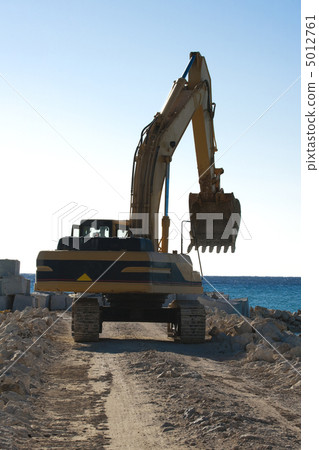 Yellow Excavator at Work 5012761