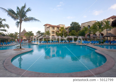 Beautiful pool and patio in tropical setting Beautiful pool and patio in tropical setting 5012799